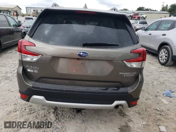 2020 Subaru Forester Touring with VIN JF2SKAXC0LH523082, listed as a Copart auction lot 85104095 with 29,463 mi miles and Salvage title. Bid and sale history available at DreamBid. Image 6.