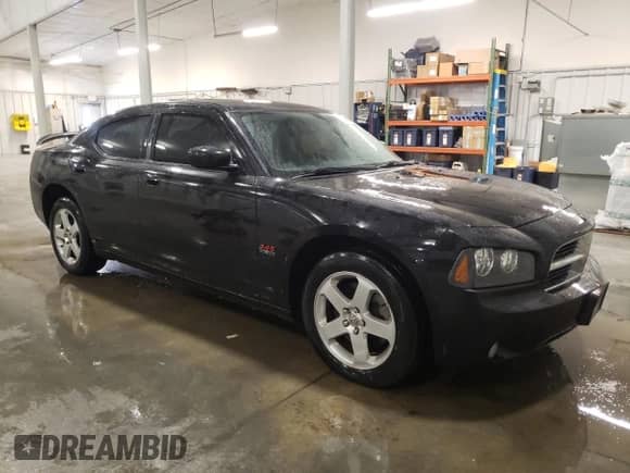 2010 Dodge Charger R/T with VIN 2B3CK5CT6AH223782, listed as a Copart auction lot 68938105 with 132,195 mi miles and Salvage title. Bid and sale history available at DreamBid. Image 4.