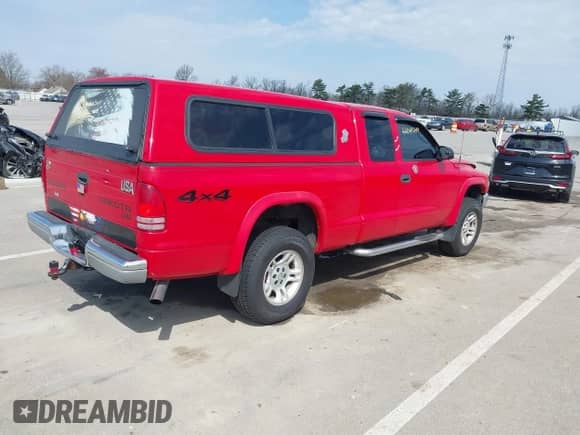2003 Dodge Dakota с VIN 1D7HG42X93S296117, выставлен на аукционе IAAI как лот 42045149 с пробегом 161 725 миль миль и . История ставок и продаж доступна на DreamBid. Изображение 4.