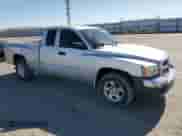 2005 Dodge Dakota SLT with VIN 1D7HE42K65S163019, listed as a Copart auction lot 67673975 with 118,096 mi miles and Salvage title. Bid and sale history available at DreamBid. Image 4.