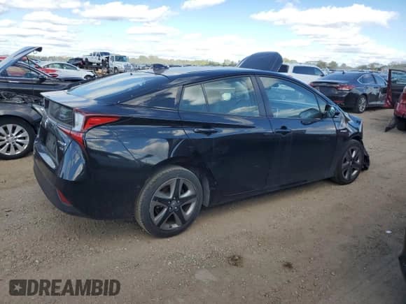 2019 Toyota Prius L Eco с VIN JTDKARFU2K3080956, выставлен на аукционе Copart как лот 70993985 с пробегом 58 231 миль миль и Списание • Salvage title. История ставок и продаж доступна на DreamBid. Изображение 3.