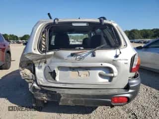 2002 Hyundai Santa Fe GLS z VIN KM8SC13D72U229318, wystawiony jako Copart lot #73178274 z przebiegiem Nie podano mil oraz Czysty tytuł • Clean title. Historia ofert i sprzedaży dostępna na DreamBid. Obrazek 6.