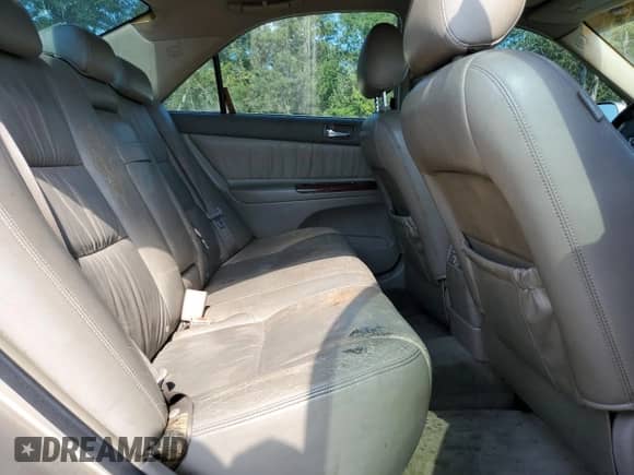 2005 Toyota Camry LE с VIN JTDBF30K050163989, выставлен на аукционе Copart как лот 69534195 с пробегом 289 449 миль миль и Списание • Salvage title. История ставок и продаж доступна на DreamBid. Изображение 10.