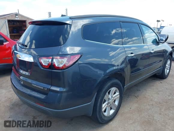 2013 Chevrolet Traverse LT with VIN 1GNKVJKD4DJ229417, listed as a IAAI auction lot 42356381 with 195,601 mi miles and . Bid and sale history available at DreamBid. Image 4.