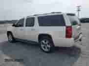 2014 Chevrolet Suburban LTZ with VIN 1GNSKKE70ER237697, listed as a Copart auction lot 60029745 with 86,469 mi miles and Salvage title. Bid and sale history available at DreamBid. Image 2.