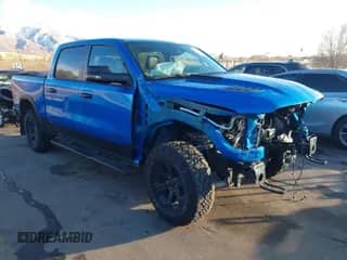 2024 Ram 1500 Rebel z VIN 1C6SRFLT9RN165687, wystawiony jako IAAI lot #41182485 z przebiegiem 4 211 mil mil oraz . Historia ofert i sprzedaży dostępna na DreamBid. Obrazek 1.