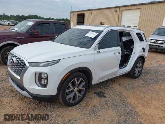 2020 Hyundai Palisade SEL with VIN KM8R34HE1LU138001, listed as a IAAI auction lot 43252112 with 105,955 mi miles and . Bid and sale history available at DreamBid. Image 2.