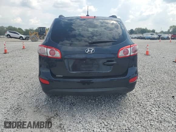 2012 Hyundai Santa Fe GLS z VIN 5XYZG3ABXCG128913, wystawiony jako Copart lot #68923815 z przebiegiem 195 839 mil mil oraz Szkoda całkowita • Salvage title. Historia ofert i sprzedaży dostępna na DreamBid. Obrazek 6.