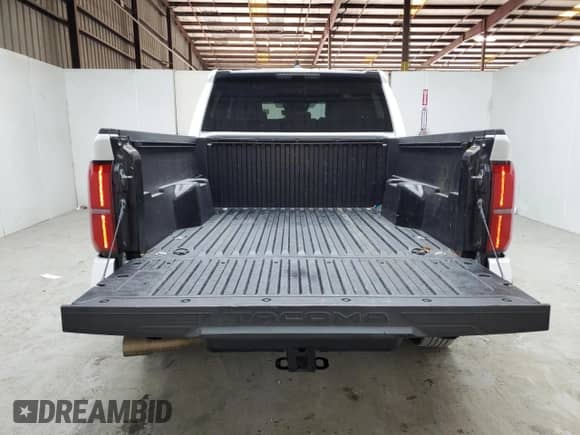 2024 Toyota Tacoma SR5 with VIN 3TMKB5FN2RM011207, listed as a Copart auction lot 80397465 with 28,515 mi miles and Clean title. Bid and sale history available at DreamBid. Image 6.