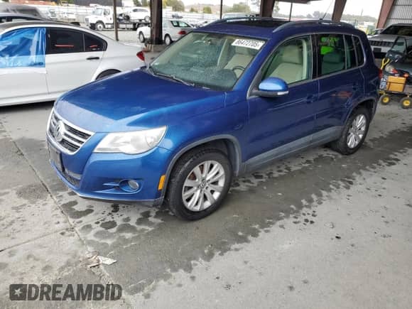 2009 Volkswagen Tiguan S с VIN WVGAV75N19W533306, выставлен на аукционе Copart как лот 86472705 с пробегом 128 818 миль миль и Списание • Salvage title. История ставок и продаж доступна на DreamBid. Изображение 1.