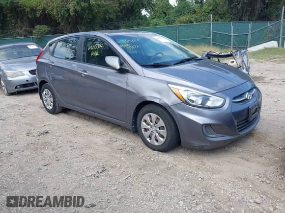 2015 Hyundai Accent GS z VIN KMHCT5AE3FU231810, wystawiony jako IAAI lot #43288304 z przebiegiem 112 888 mil mil oraz . Historia ofert i sprzedaży dostępna na DreamBid. Obrazek 1.