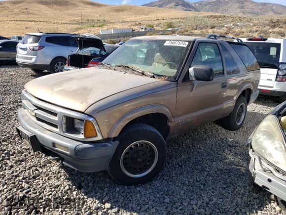 1997 Chevrolet Blazer LS с VIN 1GNCT18W5VK104375, выставлен на аукционе Copart как лот 81480684 с пробегом 199 351 миль миль и Чистый • Clean title. История ставок и продаж доступна на DreamBid. Изображение 1.