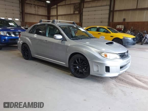 2012 Subaru WRX WRX with VIN JF1GV7E68CG024926, listed as a IAAI auction lot 43028605 with 117,408 mi miles and . Bid and sale history available at DreamBid. Image 1.