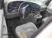 2001 Ford Econoline Cargo z VIN 1FTRE142X1HB27593, wystawiony jako Copart lot #83827154 z przebiegiem 190 761 mil mil oraz Szkoda całkowita • Salvage title. Historia ofert i sprzedaży dostępna na DreamBid. Obrazek 8.