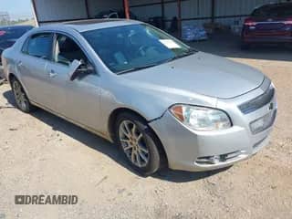 2012 Chevrolet Malibu LTZ z VIN 1G1ZG5E7XCF271129, wystawiony jako IAAI lot #42713063 z przebiegiem 127 511 mil mil oraz . Historia ofert i sprzedaży dostępna na DreamBid. Obrazek 1.