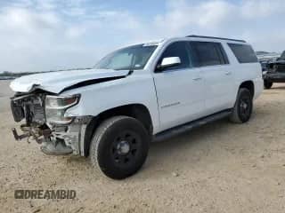 2017 Chevrolet Suburban Commercial with VIN 1GNSKKEC2HR358698, listed as a Copart auction lot 49236005 with 186,171 mi miles and Salvage title. Bid and sale history available at DreamBid. Image 1.