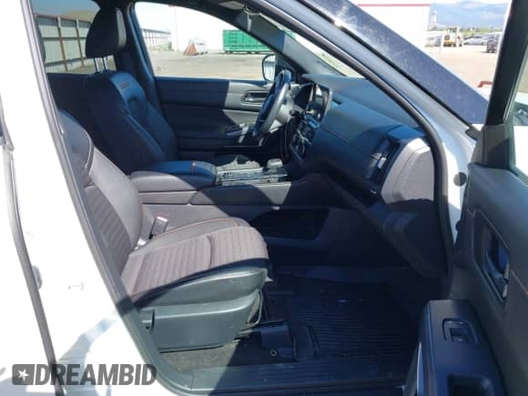 2023 Nissan Pathfinder Rock Creek with VIN 5N1DR3BD2PC270554, listed as a IAAI auction lot 42200457 with 18,249 mi miles and . Bid and sale history available at DreamBid. Image 5.