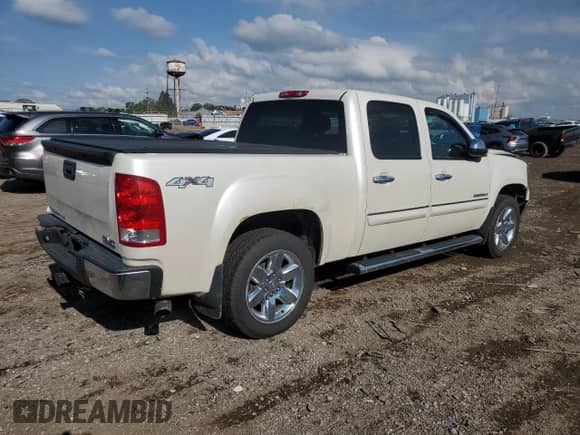 2013 GMC Sierra 1500 SLT с VIN 3GTP2WE7XDG210317, выставлен на аукционе Copart как лот 70132025 с пробегом 128 727 миль миль и Списание • Salvage title. История ставок и продаж доступна на DreamBid. Изображение 3.