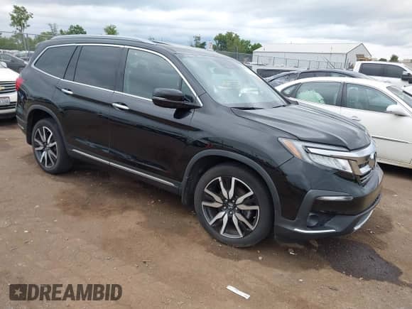 2021 Honda Pilot Elite z VIN 5FNYF6H00MB085972, wystawiony jako IAAI lot #43027676 z przebiegiem 48 133 mil mil oraz . Historia ofert i sprzedaży dostępna na DreamBid. Obrazek 1.