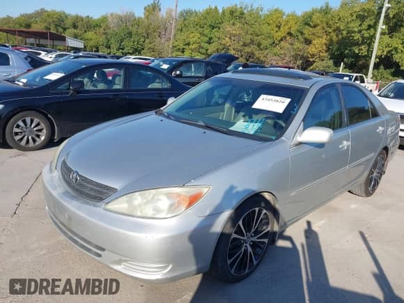 2002 Toyota Camry XLE с VIN 4T1BF32K72U529217, выставлен на аукционе IAAI как лот 43453820 с пробегом 258 156 миль миль и . История ставок и продаж доступна на DreamBid. Изображение 2.