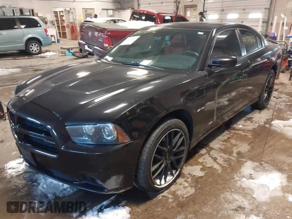2011 Dodge Charger RT Max with VIN 2B3CM5CT1BH548996, listed as a IAAI auction lot 41577876 with 191,585 mi miles and . Bid and sale history available at DreamBid. Image 17.