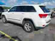 2012 Jeep Grand Cherokee Laredo z VIN 1C4RJEAG0CC259104, wystawiony jako IAAI lot #43544736 z przebiegiem 202 152 mil mil oraz . Historia ofert i sprzedaży dostępna na DreamBid. Obrazek 3.