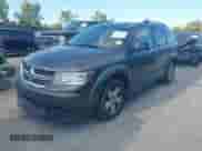 2014 Dodge Journey SE with VIN 3C4PDDAG5ET279249, listed as a IAAI auction lot 43113809 with 205,829 mi miles and . Bid and sale history available at DreamBid. Image 2.