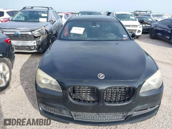 2012 BMW 7 Series 750Li z VIN WBAKB8C55CC963940, wystawiony jako IAAI lot #42545862 z przebiegiem 166 310 mil mil oraz . Historia ofert i sprzedaży dostępna na DreamBid. Obrazek 12.