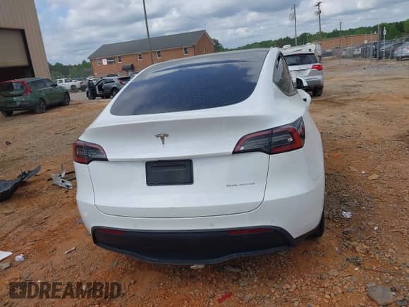 2022 Tesla Model Y Long Range z VIN 7SAYGDEE2NF385910, wystawiony jako IAAI lot #42146793 z przebiegiem 67 604 mil mil oraz . Historia ofert i sprzedaży dostępna na DreamBid. Obrazek 15.
