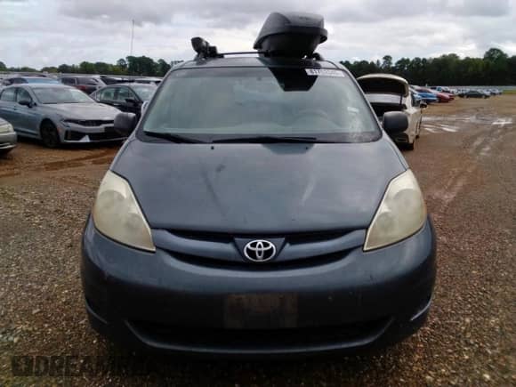 2010 Toyota Sienna LE с VIN 5TDKK4CC5AS343448, выставлен на аукционе Copart как лот 81763345 с пробегом 166 379 миль миль и Списание • Salvage title. История ставок и продаж доступна на DreamBid. Изображение 5.