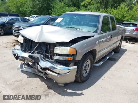 2003 GMC Sierra 1500 SLE with VIN 2GTEC19T031377419, listed as a IAAI auction lot 42665454 with 199,579 mi miles and . Bid and sale history available at DreamBid. Image 2.