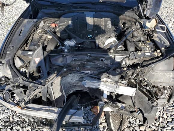 2012 BMW 5 Series 550i с VIN WBAFR9C55CDV58299, выставлен на аукционе Copart как лот 68773495 с пробегом 87 921 миль миль и Списание • Salvage title. История ставок и продаж доступна на DreamBid. Изображение 11.