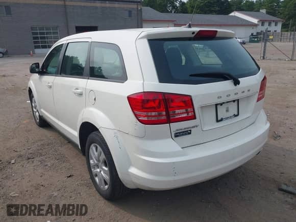 2014 Dodge Journey American Value with VIN 3C4PDCAB1ET151377, listed as a IAAI auction lot 42919609 with 131,641 mi miles and . Bid and sale history available at DreamBid. Image 3.