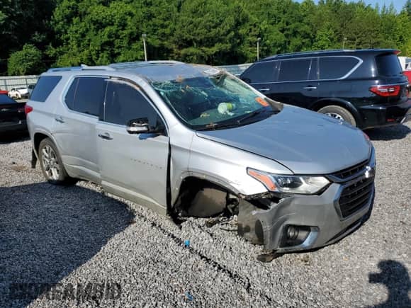 2018 Chevrolet Traverse Premier с VIN 1GNERKKW4JJ246349, выставлен на аукционе Copart как лот 62103685 с пробегом Не указан миль и Списание • Salvage title. История ставок и продаж доступна на DreamBid. Изображение 4.
