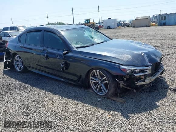 2016 BMW 7 Series 750i xDrive with VIN WBA7F2C51GG416895, listed as a IAAI auction lot 42142979 with Not provided miles and . Bid and sale history available at DreamBid. Image 1.
