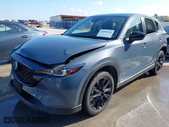 2023 Mazda CX-5 S Preferred z VIN JM3KFBCM3P0164913, wystawiony jako IAAI lot #43090454 z przebiegiem 48 866 mil mil oraz . Historia ofert i sprzedaży dostępna na DreamBid. Obrazek 2.