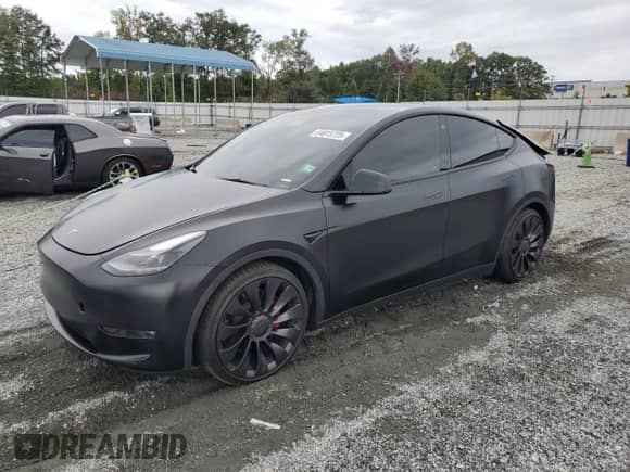 2023 Tesla Model Y Performance с VIN 7SAYGDEF5PF705233, выставлен на аукционе Copart как лот 84615725 с пробегом 26 322 миль миль и Списание • Salvage title. История ставок и продаж доступна на DreamBid. Изображение 1.
