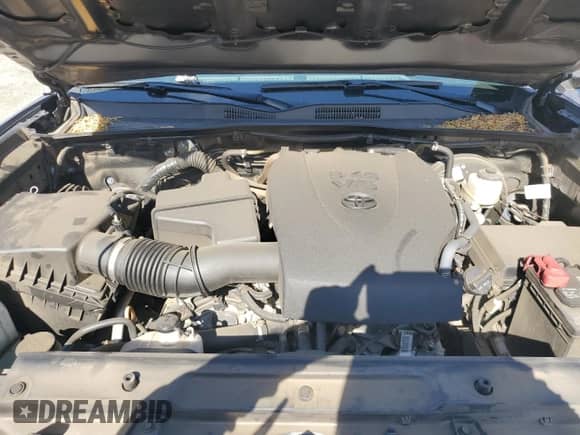 2022 Toyota Tacoma SR z VIN 3TYSZ5AN6NT095677, wystawiony jako Copart lot #84992975 z przebiegiem 25 953 mil mil oraz Szkoda całkowita • Salvage title. Historia ofert i sprzedaży dostępna na DreamBid. Obrazek 11.
