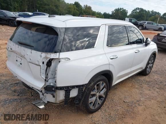 2020 Hyundai Palisade SEL with VIN KM8R34HE1LU138001, listed as a IAAI auction lot 43252112 with 105,955 mi miles and . Bid and sale history available at DreamBid. Image 4.
