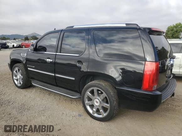 2009 Cadillac Escalade with VIN 1GYFK23289R122492, listed as a Copart auction lot 66228565 with 127,315 mi miles and Salvage title. Bid and sale history available at DreamBid. Image 2.