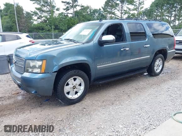 2009 Chevrolet Suburban LTZ with VIN 1GNFC36029R291904, listed as a IAAI auction lot 42710793 with 263,220 mi miles and . Bid and sale history available at DreamBid. Image 17.