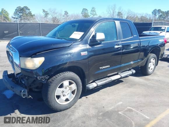 2007 Toyota Tundra Limited with VIN 5TBBV58137S461598, listed as a IAAI auction lot 41697517 with 243,772 mi miles and . Bid and sale history available at DreamBid. Image 18.