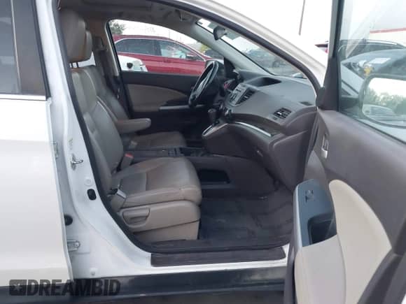 2014 Honda CR-V EX-L with VIN 5J6RM4H76EL027398, listed as a IAAI auction lot 43227212 with 196,915 mi miles and . Bid and sale history available at DreamBid. Image 5.