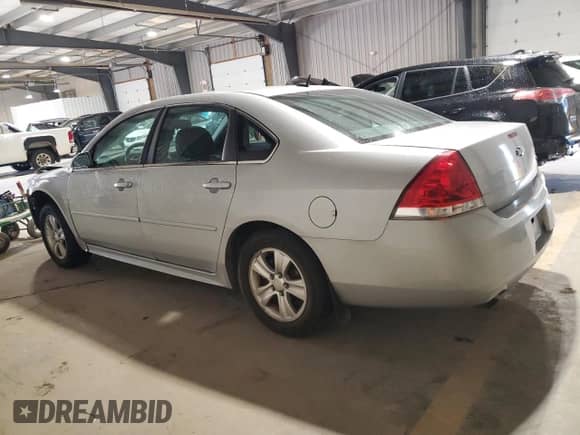 2013 Chevrolet Impala LS with VIN 2G1WF5E38D1140454, listed as a Copart auction lot 85573555 with 253,798 mi miles and Salvage title. Bid and sale history available at DreamBid. Image 2.