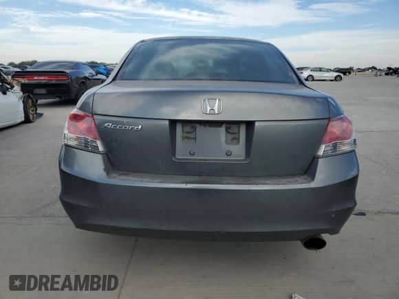 2008 Honda Accord EX z VIN JHMCP26768C033585, wystawiony jako Copart lot #86813625 z przebiegiem 155 089 mil mil oraz Szkoda całkowita • Salvage title. Historia ofert i sprzedaży dostępna na DreamBid. Obrazek 6.
