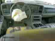 2004 Chevrolet Suburban LT z VIN 1GNFK16ZX4J277164, wystawiony jako Copart lot #57892595 z przebiegiem Nie podano mil oraz Szkoda całkowita • Salvage title. Historia ofert i sprzedaży dostępna na DreamBid. Obrazek 8.
