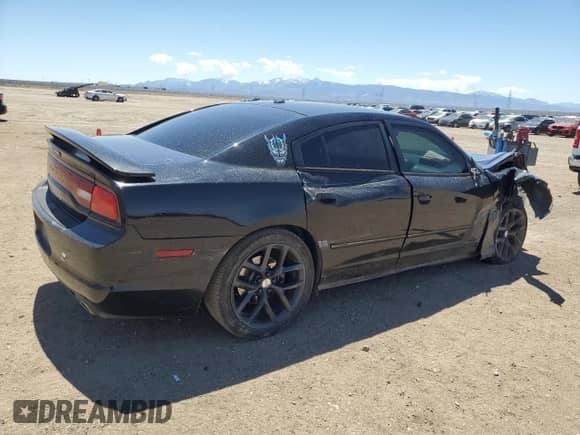 2014 Dodge Charger RT Max with VIN 2C3CDXCT6EH322357, listed as a Copart auction lot 54954995 with 149,650 mi miles and Salvage title. Bid and sale history available at DreamBid. Image 3.
