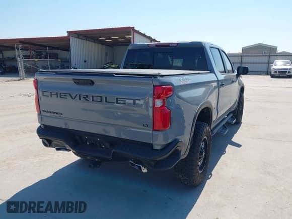 2024 Chevrolet Silverado 1500 LT Trail Boss with VIN 3GCUDFEL7RG174863, listed as a IAAI auction lot 43136773 with 12,714 mi miles and . Bid and sale history available at DreamBid. Image 4.