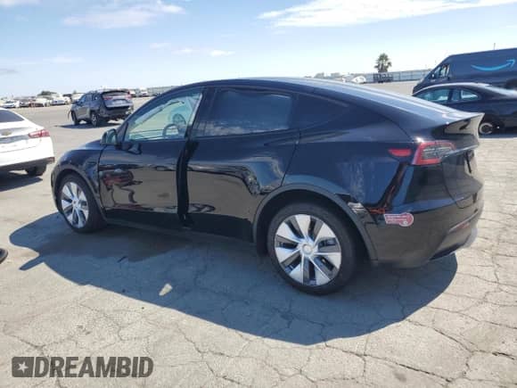2023 Tesla Model Y Long Range с VIN 7SAYGAEE3PF903721, выставлен на аукционе Copart как лот 68774815 с пробегом Не указан миль и Списание • Salvage title. История ставок и продаж доступна на DreamBid. Изображение 2.