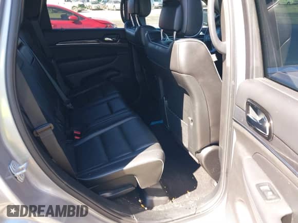 2020 Jeep Grand Cherokee High Altitude with VIN 1C4RJECG6LC129096, listed as a IAAI auction lot 41740774 with 93,988 mi miles and . Bid and sale history available at DreamBid. Image 8.